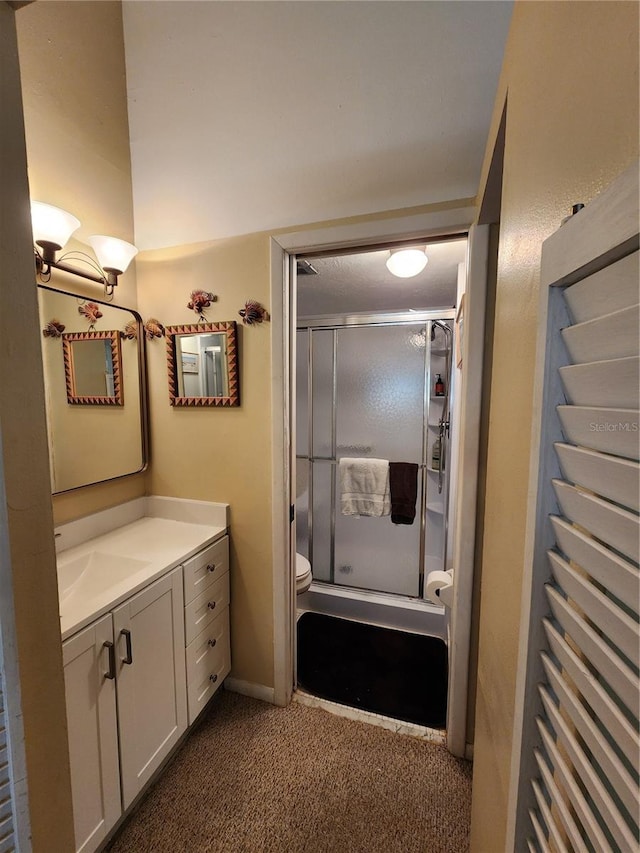 4632 Red Maple Rd Unit 1204, Bradenton, FL 34210 - full bath featuring a shower with shower door, vanity, and toilet