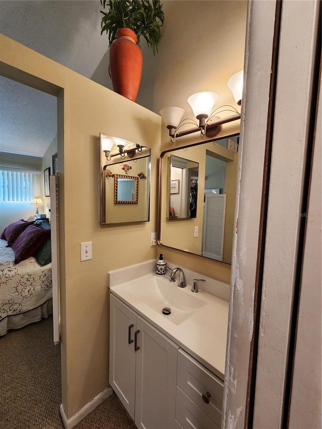 4632 Red Maple Rd Unit 1204, Bradenton, FL 34210 - ensuite bathroom featuring vanity and baseboards