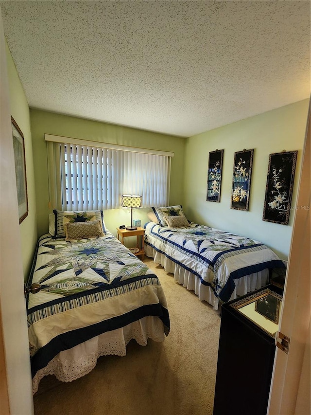4632 Red Maple Rd Unit 1204, Bradenton, FL 34210 - carpeted bedroom with a textured ceiling