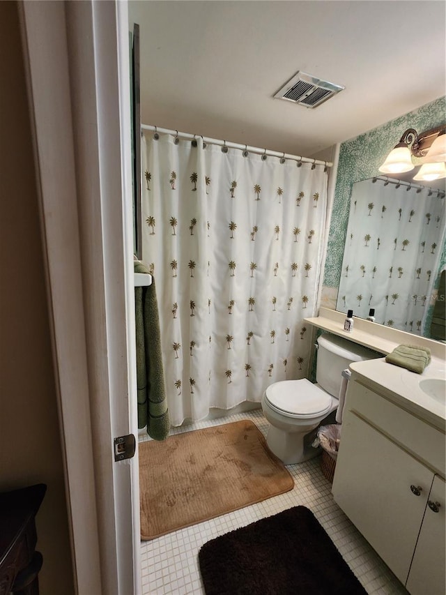 4632 Red Maple Rd Unit 1204, Bradenton, FL 34210 - bathroom featuring toilet, tile patterned flooring, vanity, and curtained shower