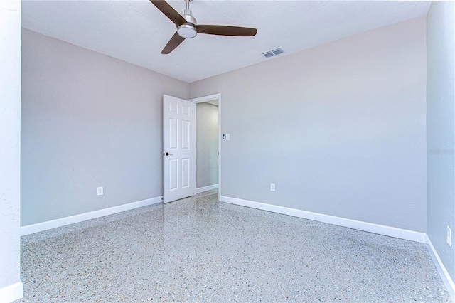 empty room featuring ceiling fan