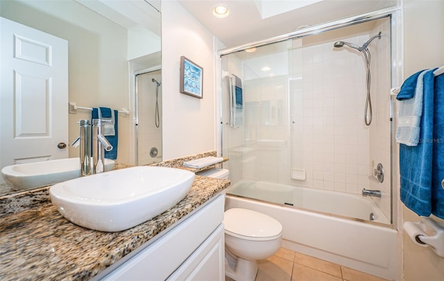 14880 Shipwatch Trce Unit 1915, Largo, FL 33774 - bathroom with vanity, toilet, shower / bath combination with glass door, tile patterned flooring, and recessed lighting