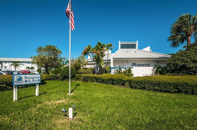 14880 Shipwatch Trce Unit 1915, Largo, FL 33774 - community sign featuring a lawn