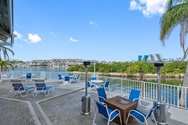 view of patio / terrace with a water view