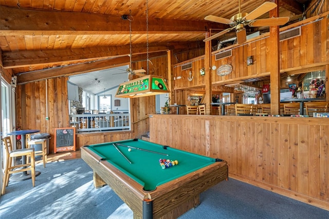 playroom with lofted ceiling with beams, wooden walls, and pool table