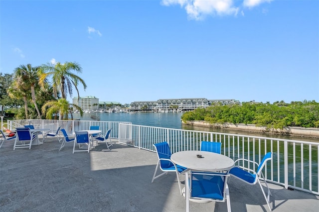 view of patio / terrace featuring a water view