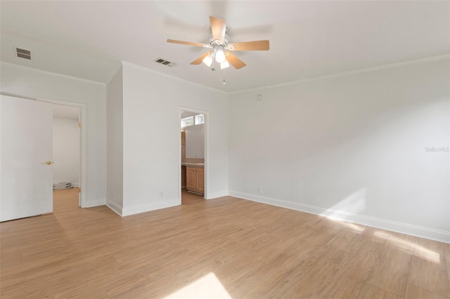 unfurnished room featuring light hardwood / wood-style flooring, ceiling fan, and ornamental molding