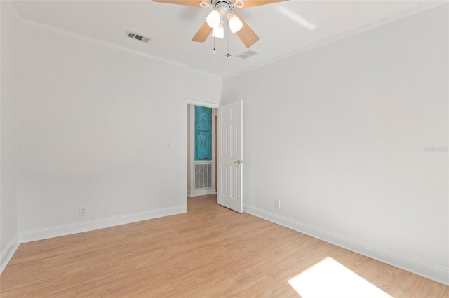 unfurnished room with ceiling fan, crown molding, and light hardwood / wood-style flooring