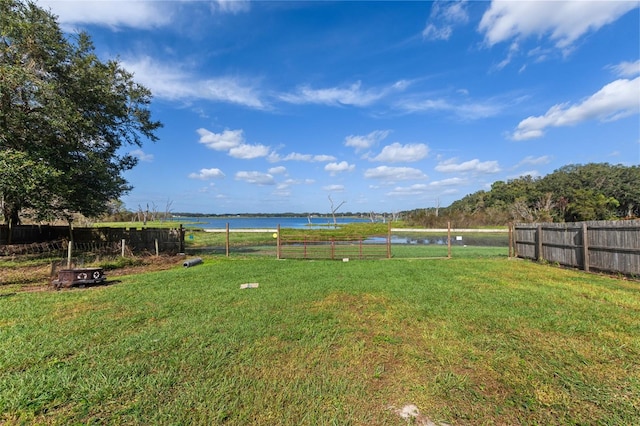 view of yard with a water view