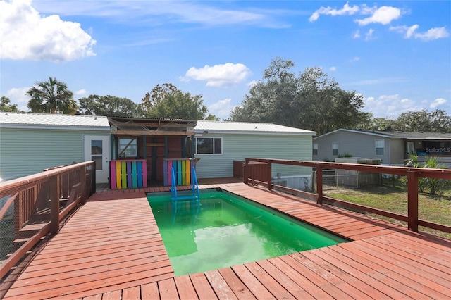 view of pool featuring a deck