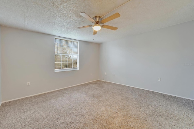 107 Caldwell Dr Unit 291, Brandon, FL 33510 - empty room with carpet flooring, ceiling fan, a textured ceiling, and baseboards