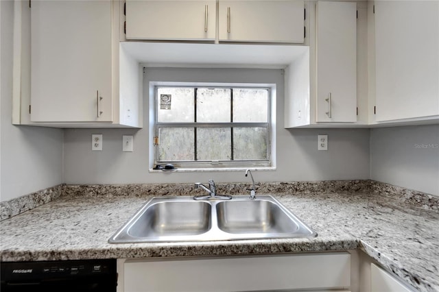 107 Caldwell Dr Unit 291, Brandon, FL 33510 - kitchen featuring a sink, dishwasher, light countertops, and white cabinets