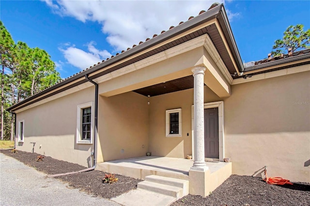 property entrance with a porch