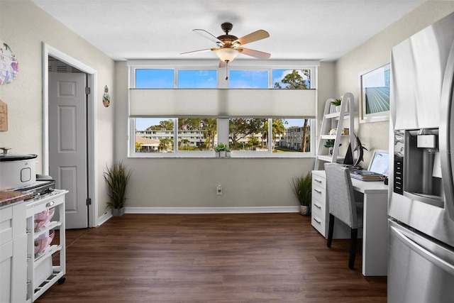 office with ceiling fan and dark hardwood / wood-style floors