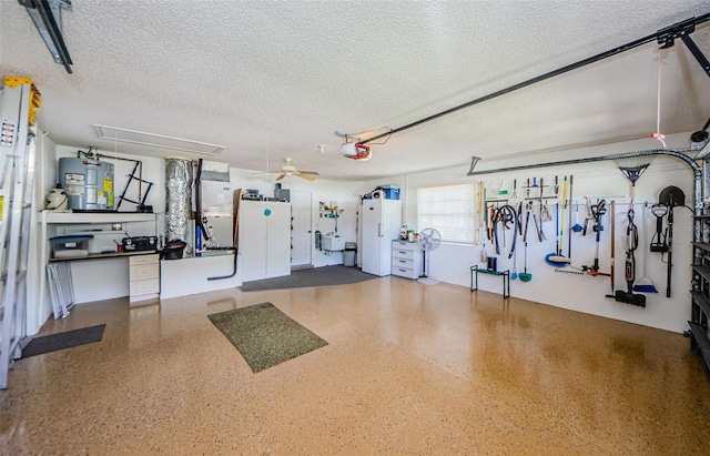 garage with white fridge, water heater, ceiling fan, and a garage door opener