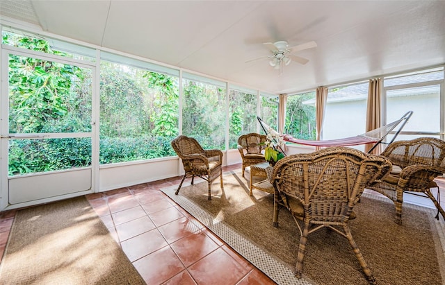 sunroom / solarium with ceiling fan