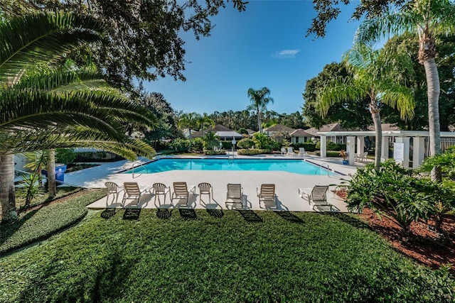 view of swimming pool featuring a patio area