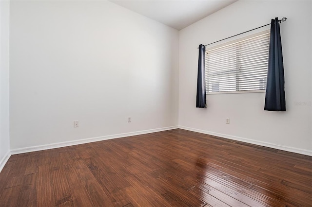 empty room featuring hardwood / wood-style flooring