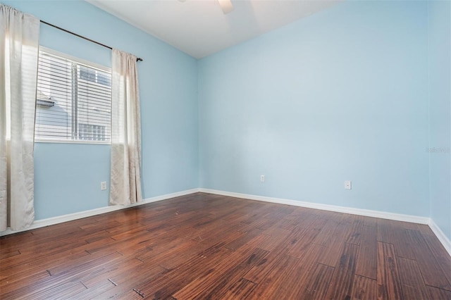 empty room with hardwood / wood-style flooring and ceiling fan