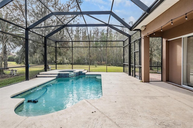 view of swimming pool with a lanai, an in ground hot tub, a yard, and a patio