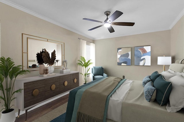 bedroom with wood finished floors, a ceiling fan, and ornamental molding