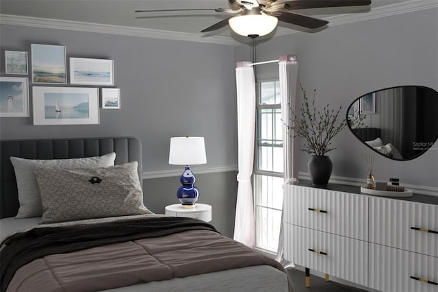 bedroom with a ceiling fan and ornamental molding