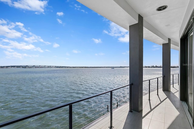 balcony featuring a water view