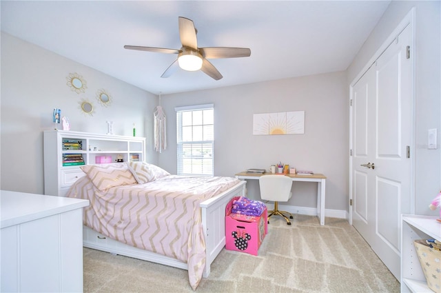 carpeted bedroom with ceiling fan