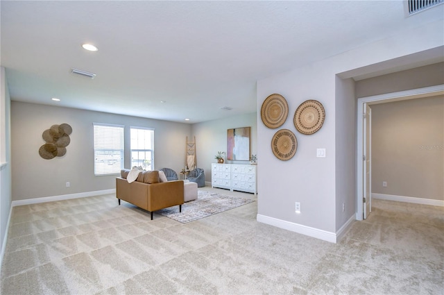 living room featuring light carpet