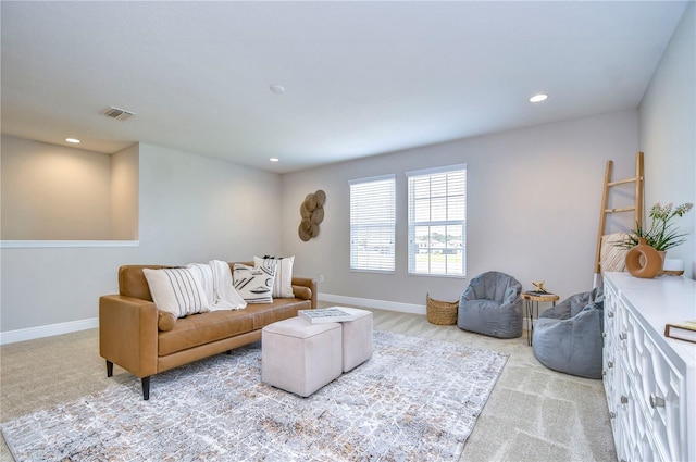 living room featuring light colored carpet