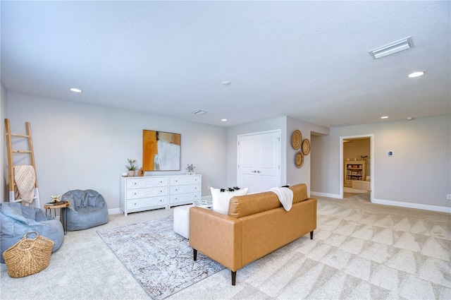 living room featuring light carpet