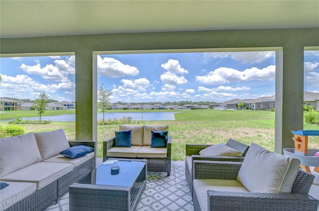 view of patio / terrace featuring outdoor lounge area and a water view