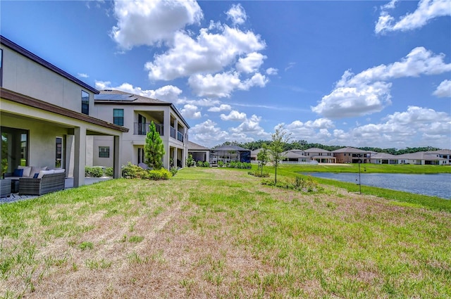 view of yard with a water view