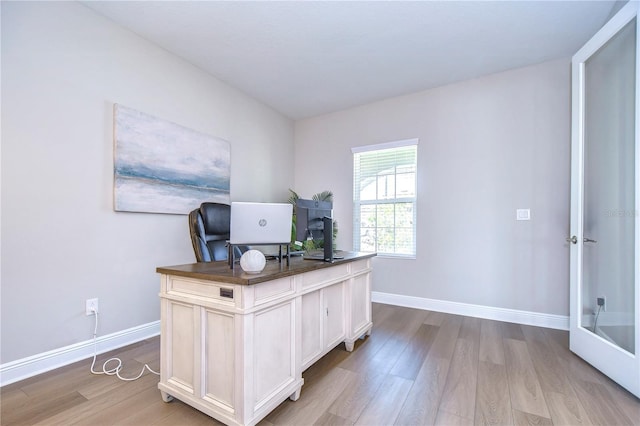 office area featuring light hardwood / wood-style floors