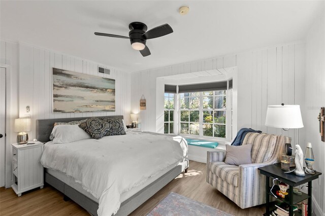 bedroom featuring hardwood / wood-style floors and ceiling fan