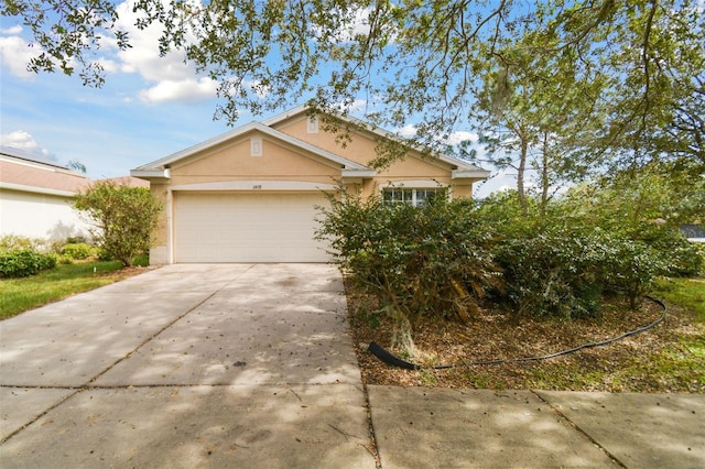 single story home with a garage