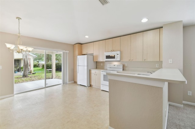 kitchen with kitchen peninsula, light brown cabinetry, white appliances, and a chandelier