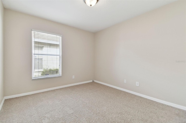 empty room with carpet flooring