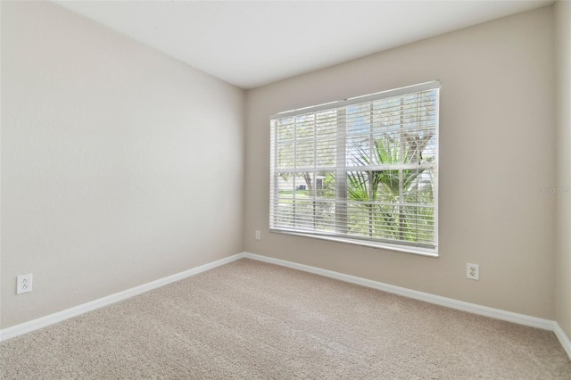 view of carpeted spare room