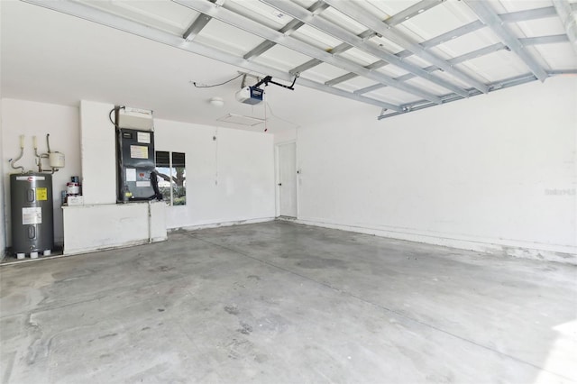 garage featuring heating unit, electric water heater, and a garage door opener