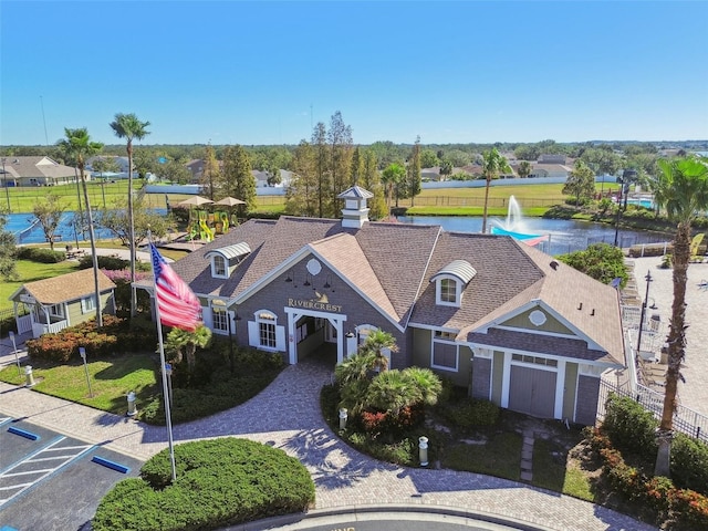 birds eye view of property featuring a water view