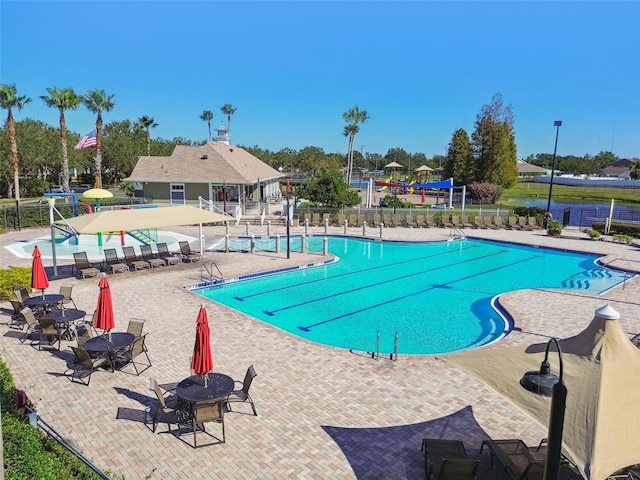 view of pool featuring a patio