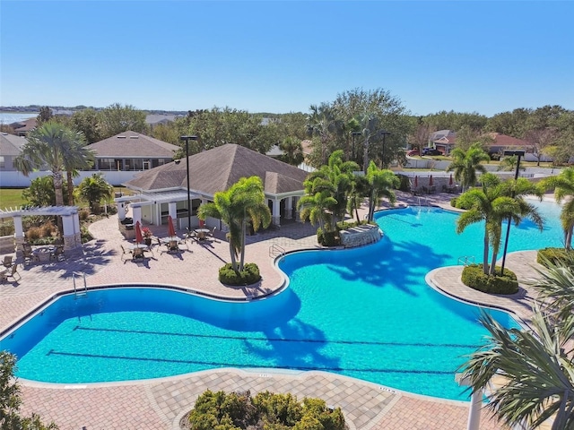 view of pool featuring a patio