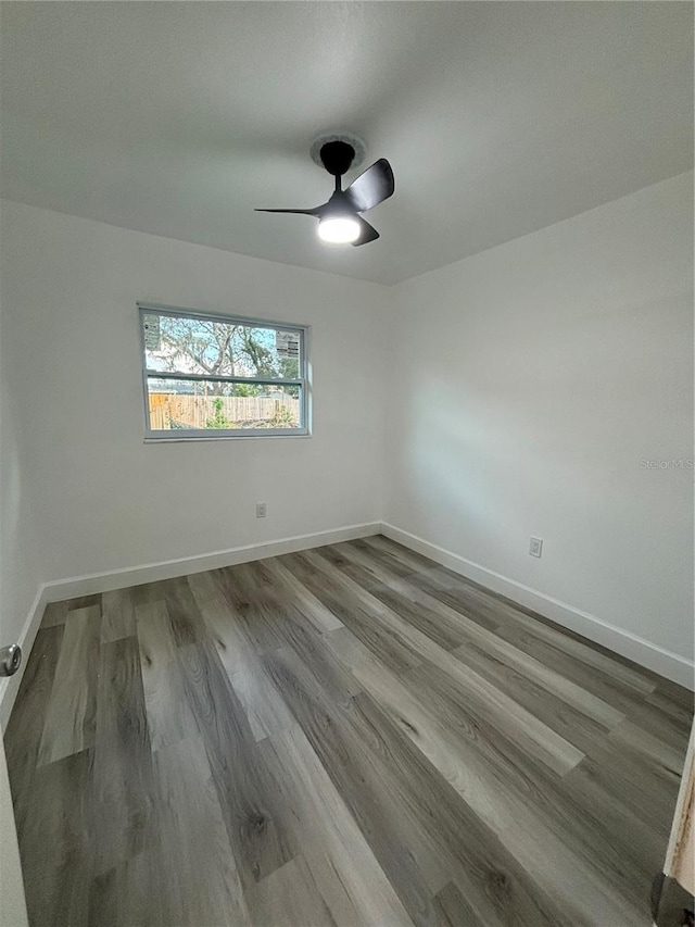 spare room with ceiling fan and light hardwood / wood-style flooring