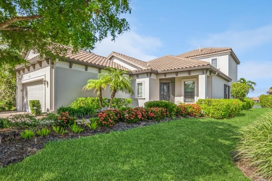 exterior space with a lawn and a garage