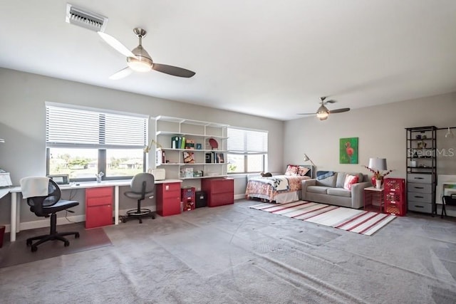 home office featuring carpet flooring and ceiling fan