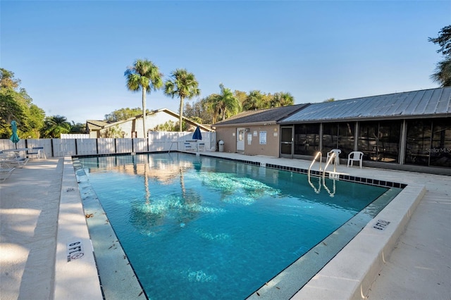 view of pool with a patio area