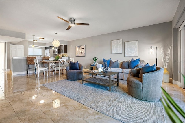 living room with ceiling fan