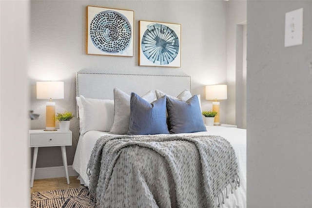 bedroom featuring hardwood / wood-style floors