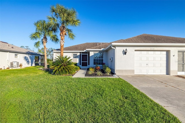 ranch-style house featuring central AC, a garage, and a front lawn